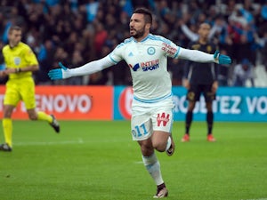 Marseille's French midfielder Romain Alessandrini celebrates after scoring a goal during the French L1 football match Olympique de Marseille vs AS Monaco on November 29, 2015