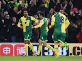 Lewis Grabban of Norwich City (7) celebrates with Jonathan Howson (8) as he scores their first and equalising goal during the Barclays Premier League match between Norwich City and Arsenal at Carrow Road on November 29, 2015