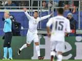 Real Madrid's Portuguese forward Cristiano Ronaldo celebrates after scoring during the UEFA Champions League group A football match between Shakhtar Donetsk and Real Madrid in Lviv on November 25, 2015