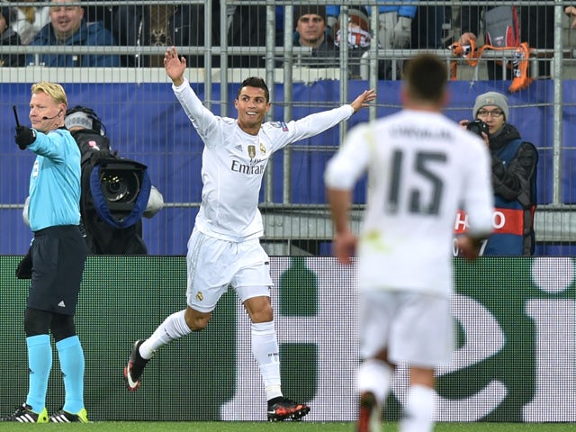 Real Madrid's Portuguese forward Cristiano Ronaldo celebrates after scoring during the UEFA Champions League group A football match between Shakhtar Donetsk and Real Madrid in Lviv on November 25, 2015