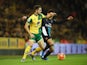 Robbie Brady of Norwich City takes on Hector Bellerin of Arsenal during the Barclays Premier League match between Norwich City and Arsenal at Carrow Road on November 29, 2015 in Norwich, England. 