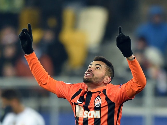 Shakhtar Donetsk's Brazilian midfielder Dentinho celebrates after scoring during the UEFA Champions League group A football match between Shakhtar Donetsk and Real Madrid in Lviv on November 25, 2015
