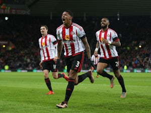 Patrick van Aanholt of Sunderland celebrates scoring his team's first goal during the Barclays Premier League match between Sunderland and Stoke City at Stadium of Light on November 28, 2015