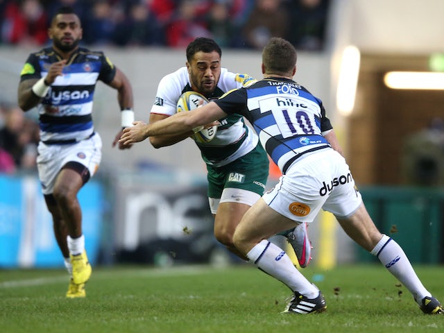 Telusa Veainu of Leicester is tackled by George Ford during the Aviva Premiership match between Leicester Tigers and Bath at Welford Road on November 29, 2015 in Leicester, England.