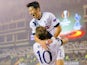 Harry Kane of Tottenham Hotspur FC is congratulated on scoring the opening goal by Son Heung-min during the UEFA Europe League match between Qarabag FK and Tottenham Hotspur FC at Tofig Bahramov Republican stadium on November 26, 2015 in Baku, Azerbaijan.