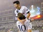 Harry Kane of Tottenham Hotspur FC is congratulated on scoring the opening goal by Son Heung-min during the UEFA Europe League match between Qarabag FK and Tottenham Hotspur FC at Tofig Bahramov Republican stadium on November 26, 2015 in Baku, Azerbaijan.