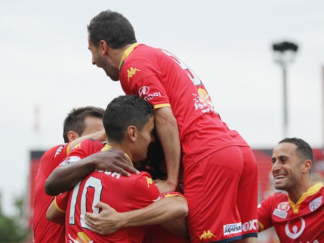 Adelaide celebrate a goal during the round nine A-League match between Adelaide United and Perth Glory at Coopers Stadium on December 6, 2015 in Adelaide, Australia.