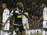 Angers' Senegalese midfielder Cheikh N'Doye celebrates after scoring a goal during the French L1 football match Lyon (OL) vs Angers (SCO) on December 5, 2015