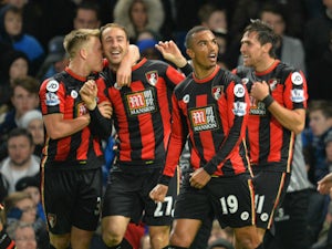 Bournemouth's English striker Glenn Murray (2L) celebrates after scoring during the English Premier League football match between Chelsea and Bournemouth at Stamford Bridge in London on December 5, 2015.