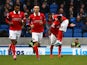 Charlton's Ademola Lookman celebrates with team Reza Ghoochannejhad after scoring the teams first goal during the Sky Bet Championship match between Brighton and Hove Albion and Charlton Athletic at The Amex Stadium on December 05, 2015