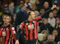 Bournemouth's English striker Glenn Murray (R) celebrates after scoring during the English Premier League football match between Chelsea and Bournemouth at Stamford Bridge in London on December 5, 2015.