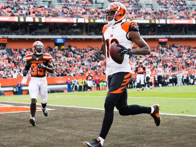 Wide receiver A.J. Green #18 of the Cincinnati Bengals scores a touchdown during the first half against the Cleveland Browns at FirstEnergy Stadium on December 6, 2015