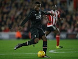 Liverpool's Belgian striker Daniel Origi shoots to score his team's fourth goal during the English League Cup quarter-final football match between Southampton and Liverpool at St Mary's Stadium in Southampton, southern England on December 2, 2015. 