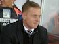 Swansea Citys English manager Garry Monk sits in the dugout during the English Premier League football match between Swansea City and Leicester City at The Liberty Stadium in Swansea, south Wales on December 5, 2015.