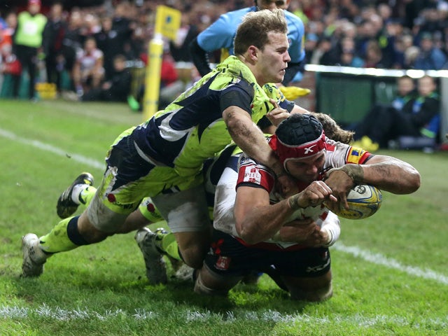 Sione Kalamafoni of Gloucester dives over for a try during the Aviva Premiership match between Gloucester and Sale Sharks at Kingsholm on December 4, 2015