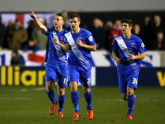 Rhys Oates of Hartlepool United (L) celebrates scoring his side's first goal from the penalty spot during the Emirates FA Cup Second Round match between Salford City and Hartlepool United at Moor Lane on December 4, 2015