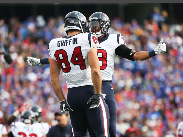 Ryan Griffin #84 of the Houston Texans celebrates a touchdown against the Buffalo Bills with Cecil Shorts #18 of the Houston Texans during the first half at Ralph Wilson Stadium on December 6, 2015