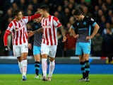 Ibrahim Afellay of Stoke City (L) celebrates his goal with Joselu of Stoke City during the Capital One Cup match between Stoke City and Sheffield Wednesday at the Britannia Stadium on December 1, 2015 in Stoke-on-Trent, England.