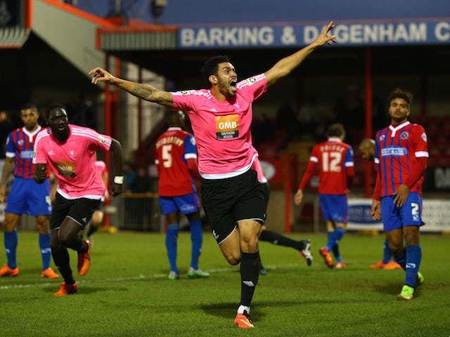 Jordan Rose of Whitehawk celebrates after he scores a last minute equaliser during the Emirates FA Cup Second Round match between Dagenham & Redbridge and Whitehawk at The Chigwell Construction Stadium on December 06, 2015 in Dagenham, England.