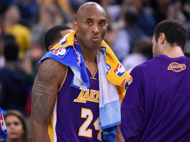 Kobe Bryant #24 of the Los Angeles Lakers looks on while there's a break during the game against against the Golden State Warriors at ORACLE Arena on November 24, 2015 in Oakland, California.