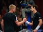 Kyle Edmund of Great Britain (L) shakes hands with Andy Murray of Great Britain (R) after victory in his Tie Break Tennis singles match on day four of the Statoil Masters Tennis at the Royal Albert Hall on December 5, 2015 in London, England.