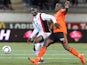 Lorient's French defender Lamine Kone (R) vies for the ball with Nice's French forward Alexandre Mendy during the French L1 football match between Lorient (FCL) and Nice (OGCN) on December 1, 2015, at the Moustoir Stadium in Lorient, western France. 