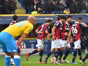 Bologna survive late Napoli comeback