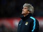 Manuel Pellegrini, manager of Manchester City looks on during the Barclays Premier League match between Stoke City and Manchester City at Britannia Stadium on December 5, 2015