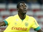 Nice's French defender Romain Genevois (L) vies with Nantes' Senegalese defender Papy Mison Djilibodji (R) during the French L1 football match between Nice and Nantes on february 8, 2015 at the Allianz Riviera stadium in Nice, southeastern France. 
