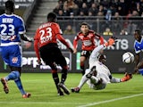 Rennes' French forward Ousmane Dembele (C) kicks the ball during the French L1 football match Rennes against Marseille on December 03, 2015