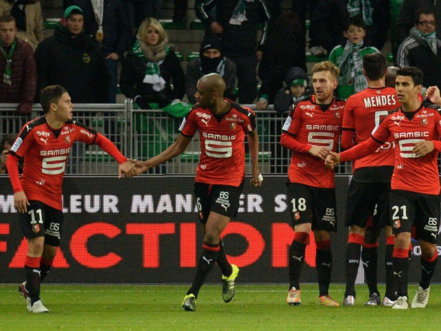Rennes' players celebrate after scoring a goal during the French L1 football match between Saint-Etienne and Rennes at the Geoffroy Guichard Stadium in Saint-Etienne, central France, on December 6, 2015