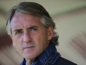 Roberto Mancini plays down title chances