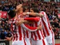 Marko Arnautovic (2nd L) of Stoke City celebrates scoring his team's first goal with his team mates during the Barclays Premier League match between Stoke City and Manchester City at Britannia Stadium on December 5, 2015