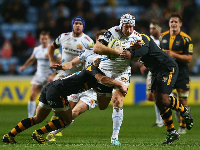 Thomas Waldrom of Exeter Chiefs makes a break during the Aviva Premiership match between Wasps and Exeter Chiefs at the Ricoh Arena on December 4, 2015 in Coventry, England.