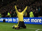 Odion Ighalo of Watford celebrates scoring his team's second goal during the Barclays Premier League match between Watford and Norwich City at Vicarage Road on December 5, 2015