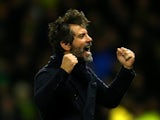Quique Flores manager of Watford celebrates his team's second goal during the Barclays Premier League match between Watford and Norwich City at Vicarage Road on December 5, 2015