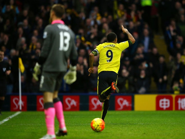 Troy Deeney of Watford celebrates scoring his team's first goal during the Barclays Premier League match between Watford and Norwich City at Vicarage Road on December 5, 2015