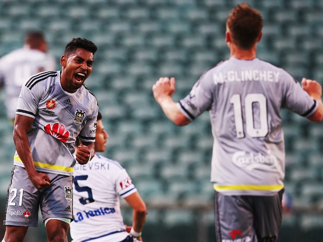 Roy Krishna of the Wellington Phoenix celebrates after Rolieny Bonevacia of the Wellington Phoenix scored attacks goal during the round nine A-League match between the Wellington Phoenix and Melbourne Victory at QBE Stadium on December 5, 2015