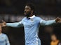 Manchester City's Ivorian striker Wilfried Bony celebrates scoring the opening goal during the English League Cup quarter-final football match between Manchester City and Hull City at the Etihad Stadium in Manchester, northwest England on December 1, 2015