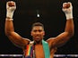 Anthony Joshua celebrates after defeating Dillian Whyte by ko on December 12, 2015