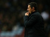 Aston Villa's French manager Remi Garde watches his players during the English Premier League football match between Aston Villa and Arsenal at Villa Park in Birmingham, central England on December 13, 2015.