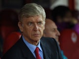 sene Wenger of Arsenal looks on during the UEFA Champions League Group F match between Olympiacos FC and Arsenal FC at Karaiskakis Stadium on December 9, 2015 in Piraeus, Greece.