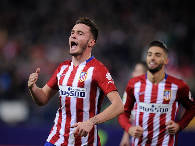 Saul Niguez of Club Atletico de Madrid celebrates after scoring his team's opening goal during the La Liga match between Club Atletico de Madrid and Athletic Club at Vicente Calderon Stadium on December 13, 2015