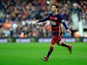 FC Barcelona's Argentinian forward Lionel Messi celebrates a goal during the Spanish league football match FC Barcelona vs RC Deportivo La Coruna at the Camp Nou stadium in Barcelona on December 12, 2015