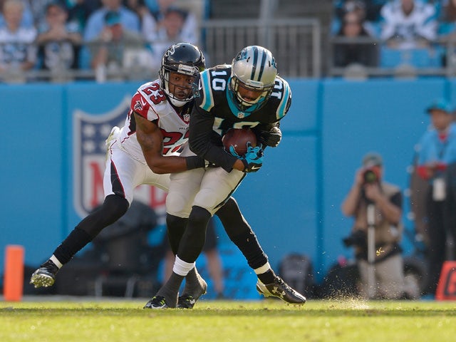 Robert Alford #23 of the Atlanta Falcons tackles Corey Brown #10 of the Carolina Panthers in the 1st quarter during their game at Bank of America Stadium on December 13, 2015