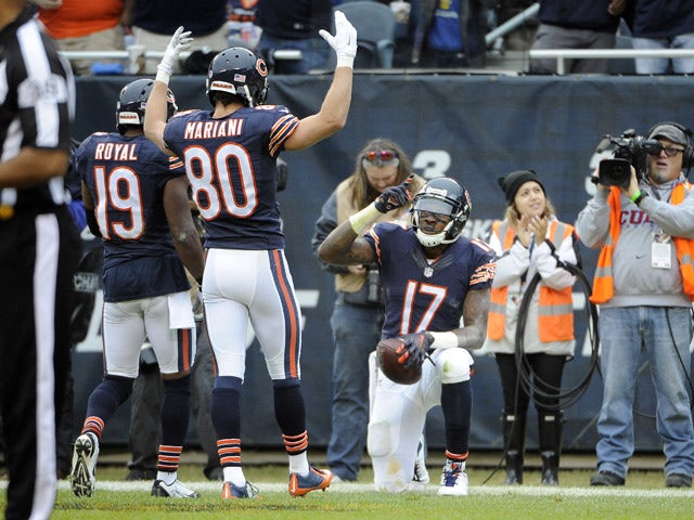 Alshon Jeffery #17 celebrates a touchdown with Eddie Royal #19 and Marc Mariani #80 of the Chicago Bears during the second quarter against the Washington Redskins on December 13, 2015