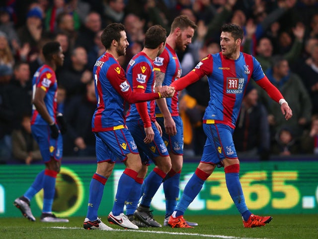 Yohan Cabaye (2nd L) of Crystal Palace celebrates scoring his team's first goal with his team mates during the Barclays Premier League match between Crystal Palace and Southampton at Selhurst Park on December 12, 2015