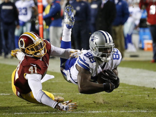 Wide receiver Dez Bryant #88 of the Dallas Cowboys catches the ball against cornerback Will Blackmon #41 of the Washington Redskins in the fourth quarter at FedExField on December 7, 2015 in Landover, Maryland. 