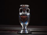A picture shows the trophy of the UEFA Euro 2016 football tournament during the final draw in Paris on December 12, 2015. 