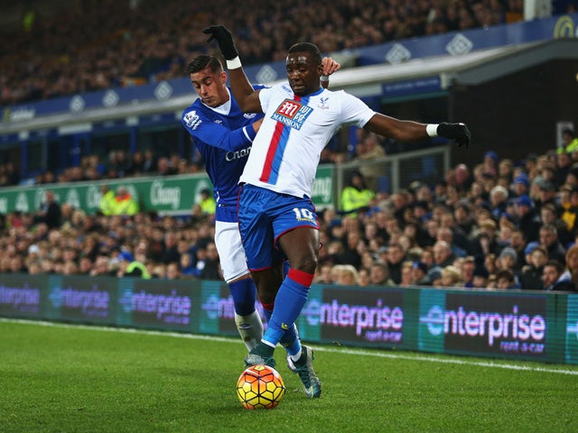 Yannick Bolasie of Crystal Palace takes on Ramiro Funes Mori of Everton during the Barclays Premier League match between Everton and Crystal Palace at Goodison Park on December 7, 2015